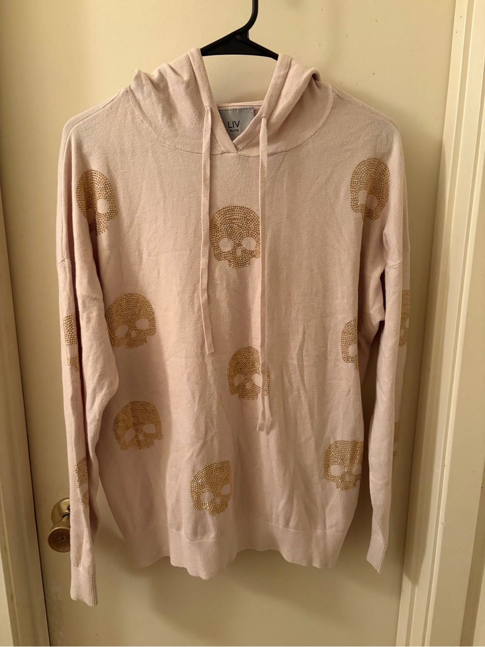 Liv Milano Pale Pink Crewneck Hoodie with Gold Skull Accents